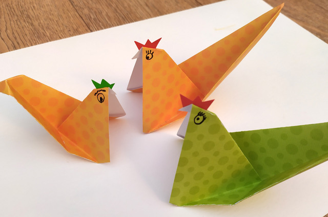 Three origami chickens.